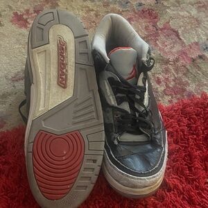 AsisBlack and White Sneakers with Red Accents